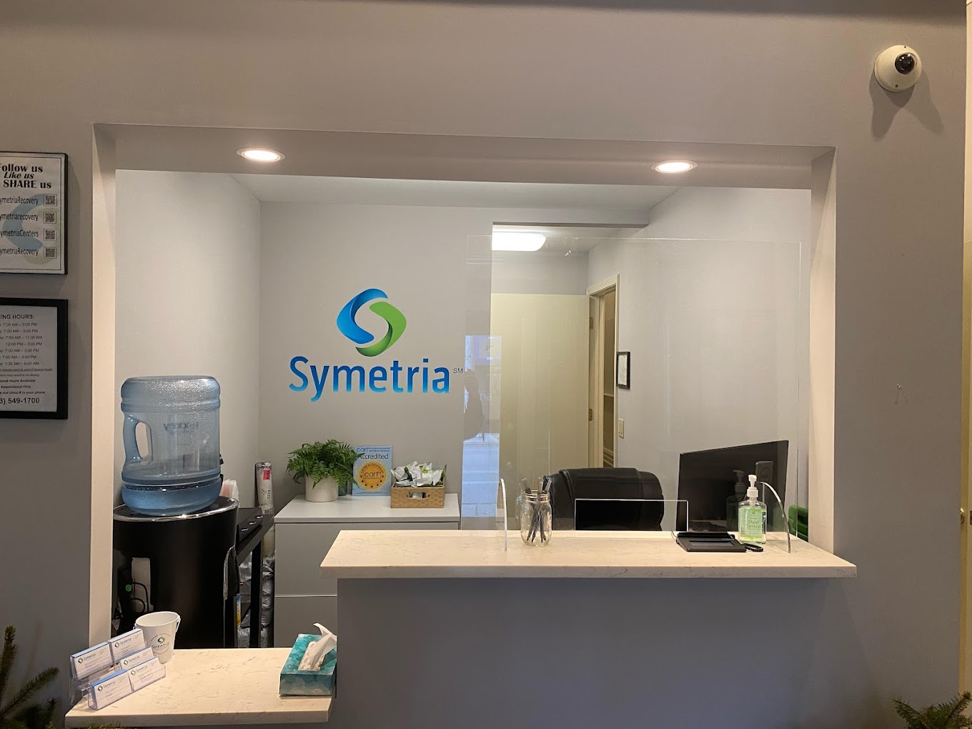 Reception area with Symetria Recovery logo.