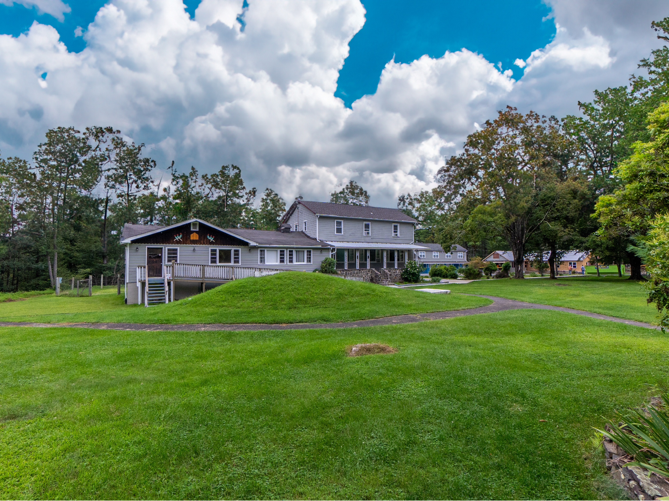 Large residential treatment center with green lawn