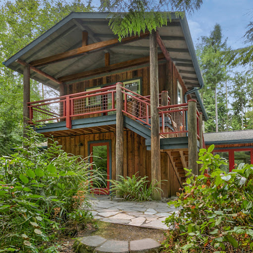 Facility exterior with entrance and stairs.