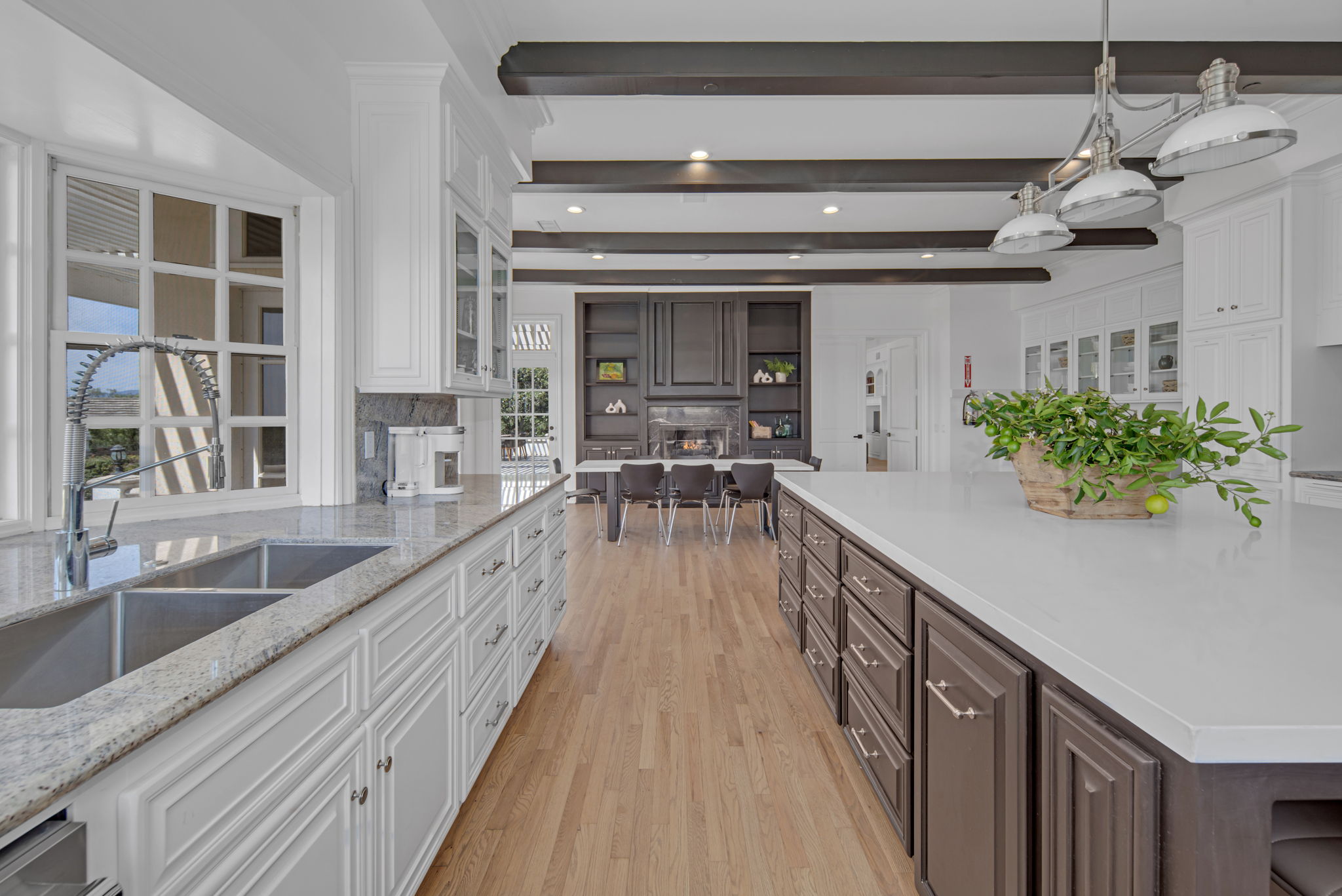 Open kitchen layout showing dining table and large island