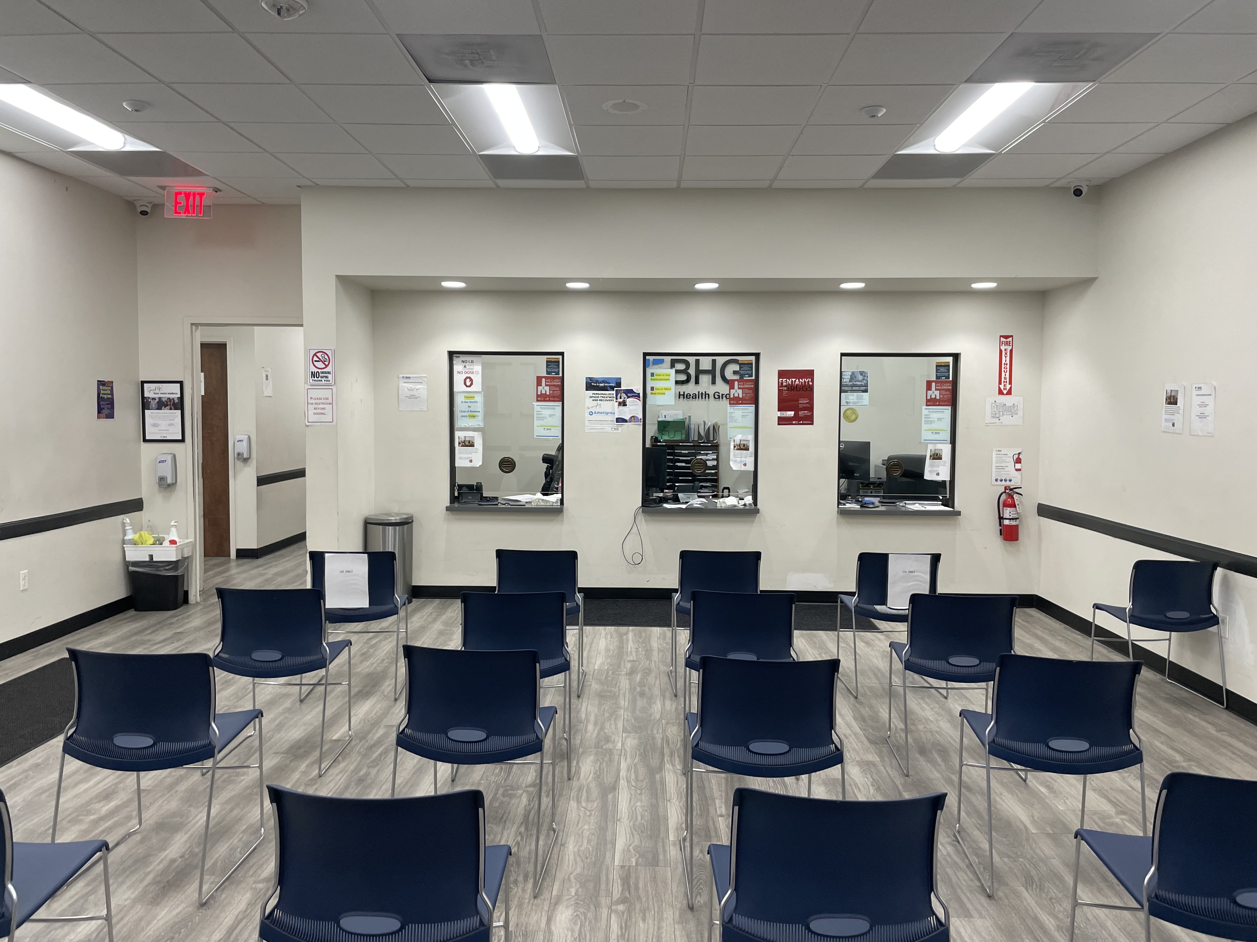 Patient service windows inside the clinic waiting area